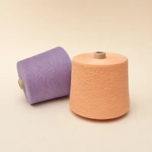 Sợi Cotton Nhuộm Màu Cam Đào Và Tím Nhạt Hai cuộn sợi cotton nhuộm màu cam đào và tím nhạt cho dệt tất