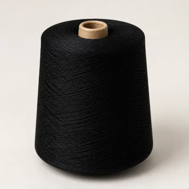 Cone sợi cotton mercerized JC60S/2 màu đen trên nền sáng