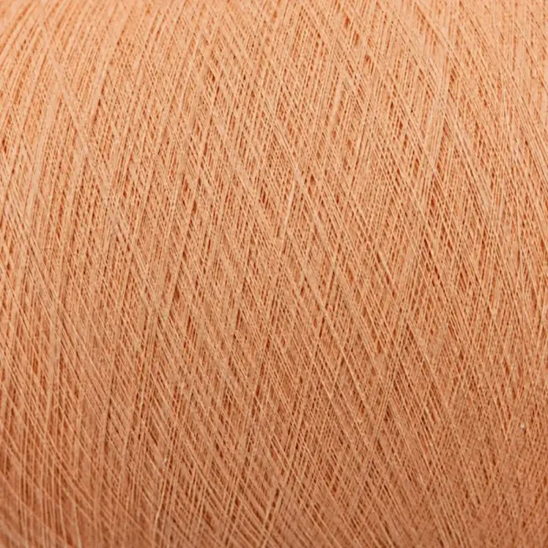 Bề mặt sợi cotton màu cam đào Cận cảnh bề mặt sợi cotton chải kỹ nhuộm màu cam đào JC32S/1