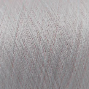 Cận cảnh bề mặt sợi cotton mercerized 100% Cận cảnh cấu trúc sợi cotton mercerized 100% màu trắng pha hồng
