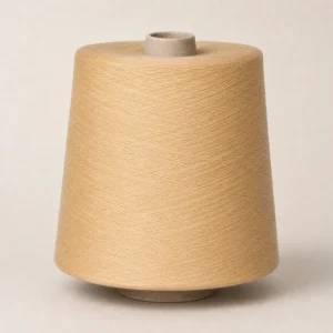 Sợi Cotton Chải Kỹ Nhuộm Màu Be Dạng Cone Cuộn sợi cotton chải kỹ nhuộm màu be dạng cone
