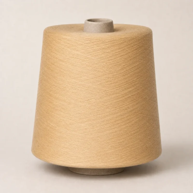 Sợi Cotton Chải Kỹ Nhuộm Màu Be Dạng Cone Cuộn sợi cotton chải kỹ nhuộm màu be dạng cone