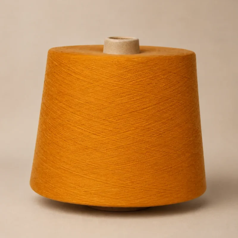 Sợi Cotton Mercerized JC60S2 Màu Vàng Cam Sợi cotton mercerized JC60S/2 màu vàng cam, quấn cone đơn với bề mặt sợi rõ nét