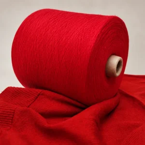Sợi Cotton Nhuộm Đỏ 40S1 Chải Kỹ Cone sợi cotton nhuộm đỏ 40S/1 trên vải dệt kim màu đỏ