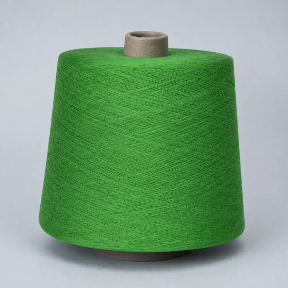 Cone sợi cotton 32/1 nhuộm màu xanh lá, chải kỹ Ring Spun