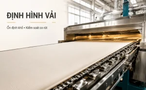 Vải được định hình trên máy stenter để ổn định khổ và kiểm soát co rút