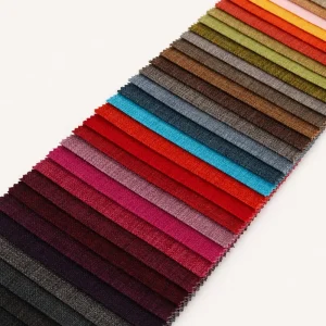 Bảng màu vải bố polyester xếp chéo gồm các gam đỏ, xanh, nâu và tím